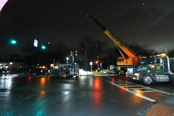 Crane and Luizzi truck at night