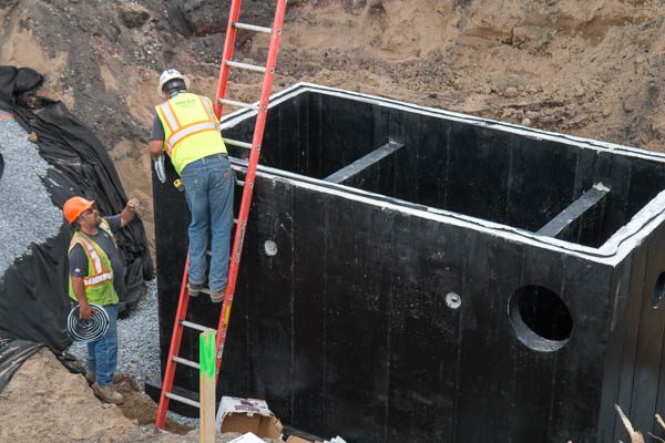 Worker sealing the vault